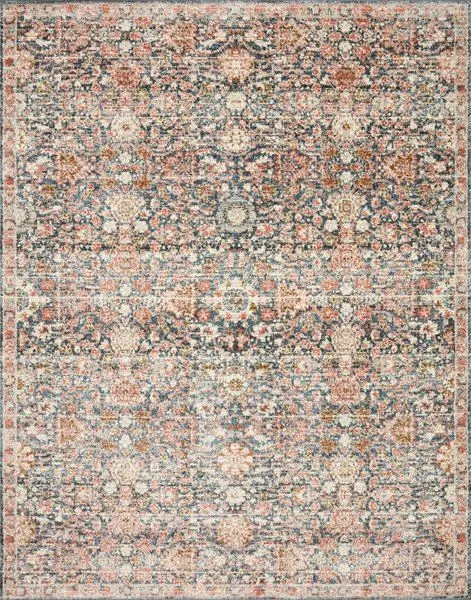 Traditional navy and rust rug with intricate floral and geometric patterns, power-loomed polyester pile