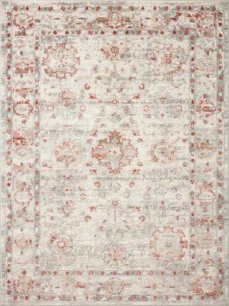 Traditional Estelle rug with ivory background, muted blue border, rust and beige floral motifs