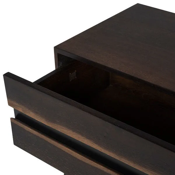 Prana Side Table in sleek black wood with thin black metal legs and a drawer front with natural wood grain texture