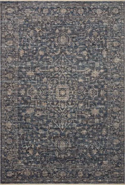 Sorrento Midnight / Natural traditional area rug with intricate faded vintage-style pattern in blue and beige hues