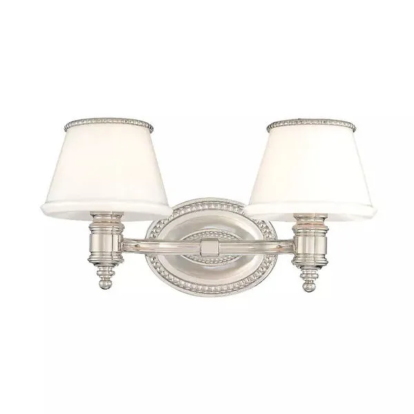 Richmond 2 Light Bath Bracket with polished metal finish, dentil cornices on white tapered shades, and oval backplate
