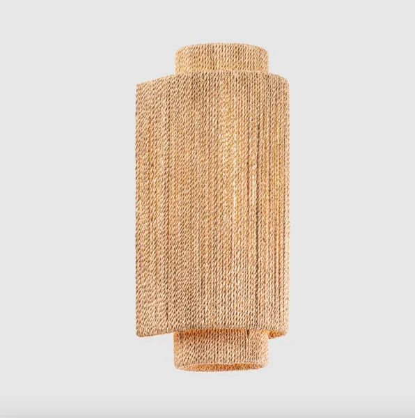 Front view of Metuchen Wall Sconce against grey background highlighting natural color and shadow
