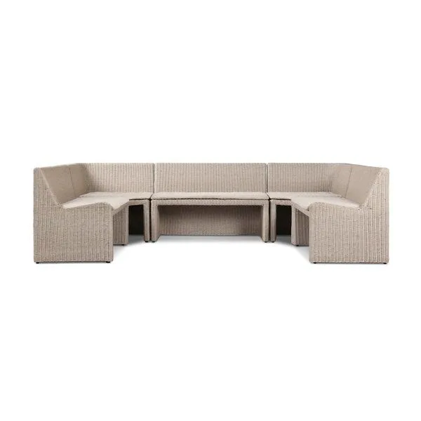 U-shaped outdoor dining banquette in vintage white rattan with soft-lined frame and cushioned seats