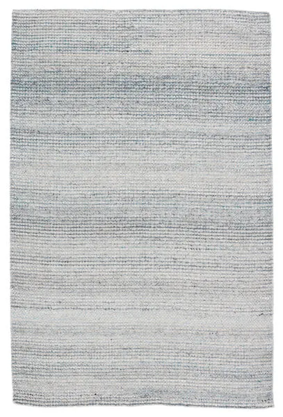 Solid blue and white indoor/outdoor area rug with a striated texture and durable handwoven PET yarn construction