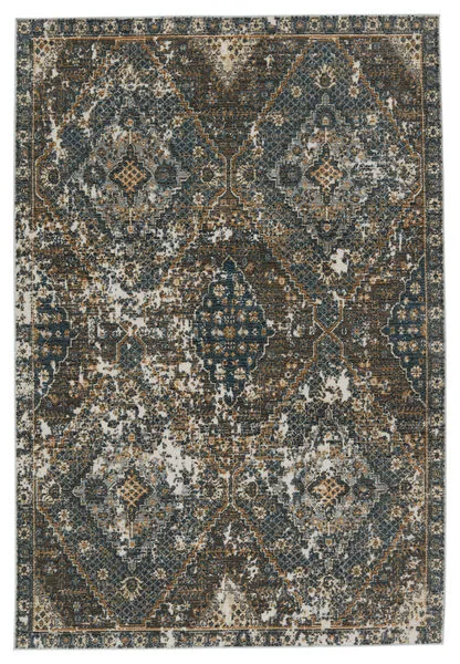 Julia blue and gold area rug with a faded Turkish-inspired medallion and repeating diamond pattern