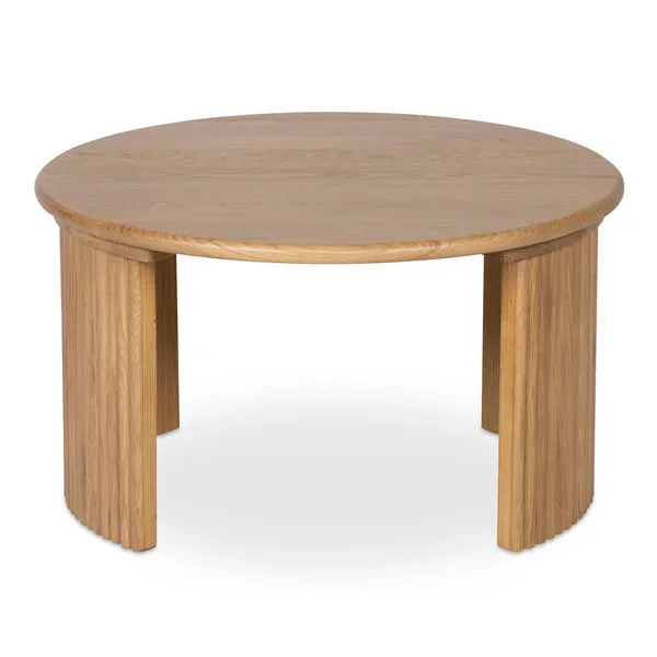 Round coffee table with solid oak wood and fluted curved legs in a natural finish