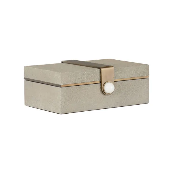 Rectangular luxury Steven Box in textured light gray shagreen with brass strap and white knob closure.