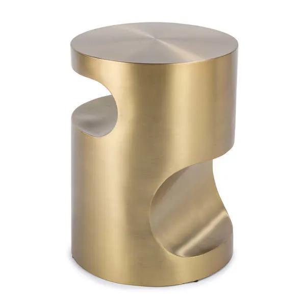 Nathan Side Table in brushed brass finish featuring sculptural curves and a round top with cutout detailing
