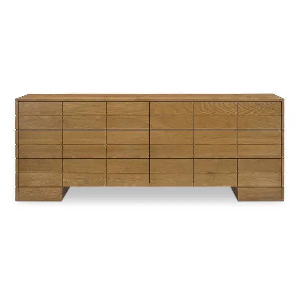 Gia 6-drawer dresser in mid-tone brown oak wood with uniform drawer blocks and subtle geometric design