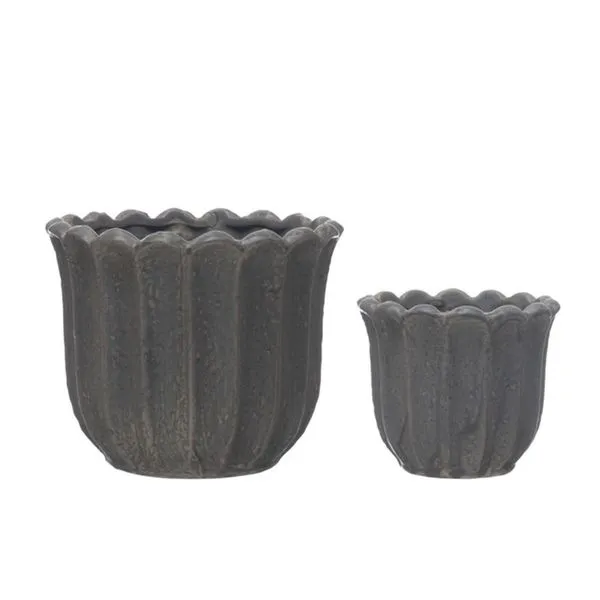 Side view showing two sizes of the daisy-shaped stoneware planters in grey and black
