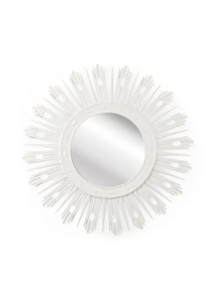 White lacquer starburst mirror with circular center and radiating irregular spikes with cut-out details