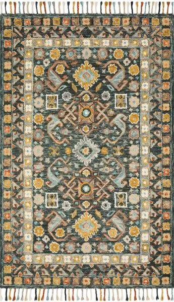wool rug with whimsical floral motifs in muted blue, yellow, orange, and cream tones with braided tassels