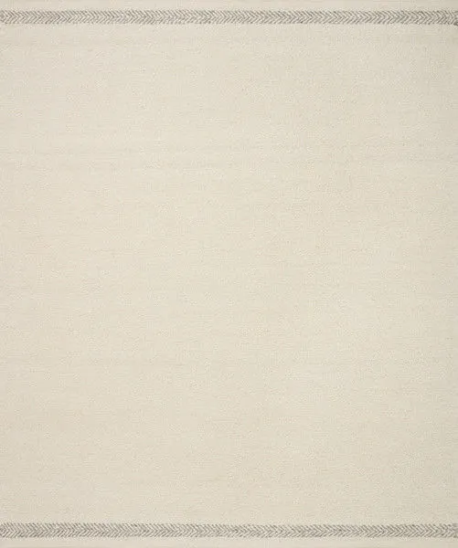 Reyla Ivory/Silver Rug in a neutral ivory tone with subtle silver herringbone borders, hand-knotted texture