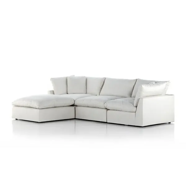 Stevie 3 Piece Sectional Sofa with Ottoman in light performance fabric, left arm-facing with plush feather-blend cushions